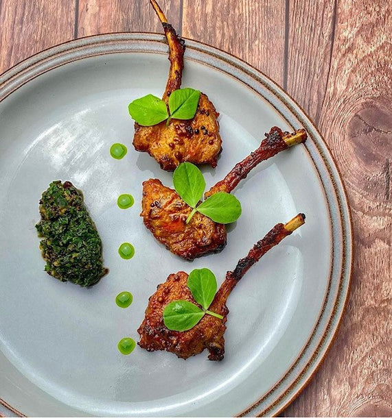 Masala Lamb Cutlets with Mint and Black Garlic Chutney and Coriander Oil