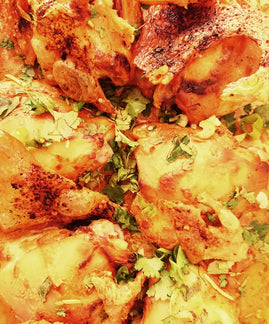 Harissa chicken with crispy skin and pearl barley salad