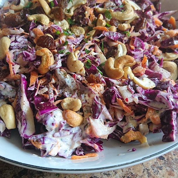 A colourful and fresh Middle Eastern coleslaw with red cabbage and cashew nuts