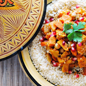 Moroccan-style vegetable tagine with squash, sweet potato, and couscous