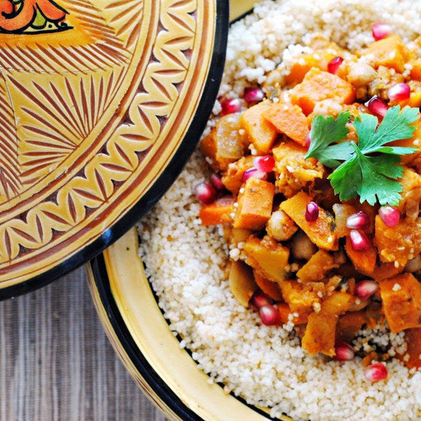 Moroccan-style vegetable tagine with squash, sweet potato, and couscous
