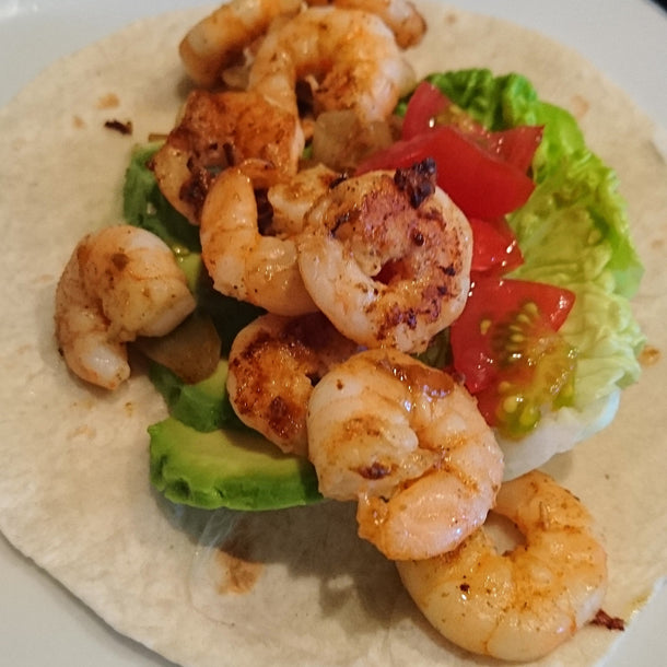 Tex Mex prawn and avocado wraps, with lettuce, tomato and sour cream