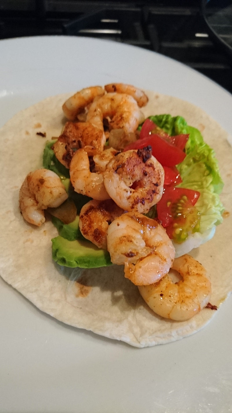 Tex Mex prawn and avocado wraps, with lettuce, tomato and sour cream