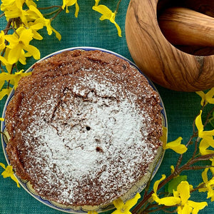 Nila’s dairy-free gingerbread hot chocolate cake with a rich chocolate sponge infused with gingerbread spices, topped with ice powder.