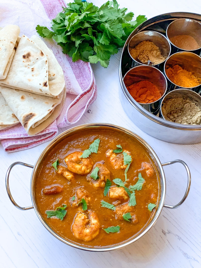 Ney’s Kitchen Sri Lankan fish curry with tender fish pieces simmered in a rich, spiced coconut and tamarind sauce with herbs.