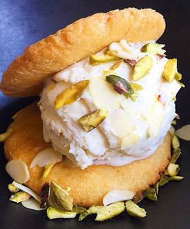 Shrikhand Ice Cream Sandwiches | Pillowy ice cream, flavoured with saffron, cardamom & pistachios.. in between flaky, buttery puri