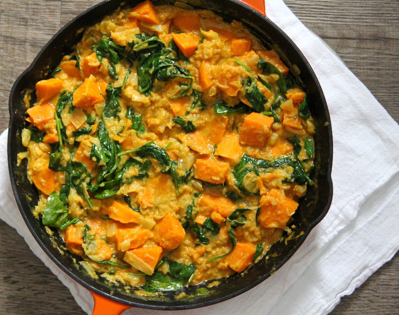 Hearty spinach dhal with tender sweet potatoes