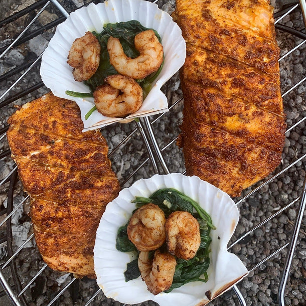 Tandoori salmon on the BBQ with salmon fillet marinated in spiced yogurt, grilled with a smoky char.