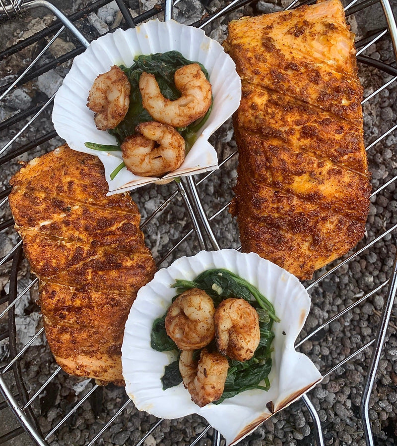 Tandoori salmon on the BBQ with salmon fillet marinated in spiced yogurt, grilled with a smoky char.