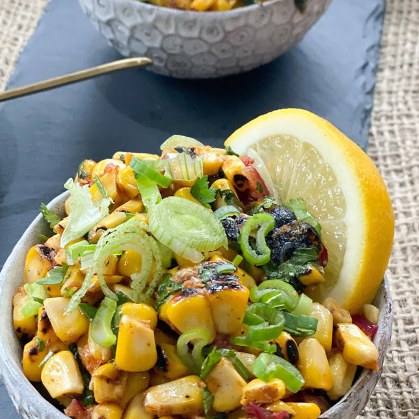 Two bowls of Masala Corn by chef Hey Renu. 