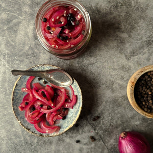 Pickled red onions in a jar 