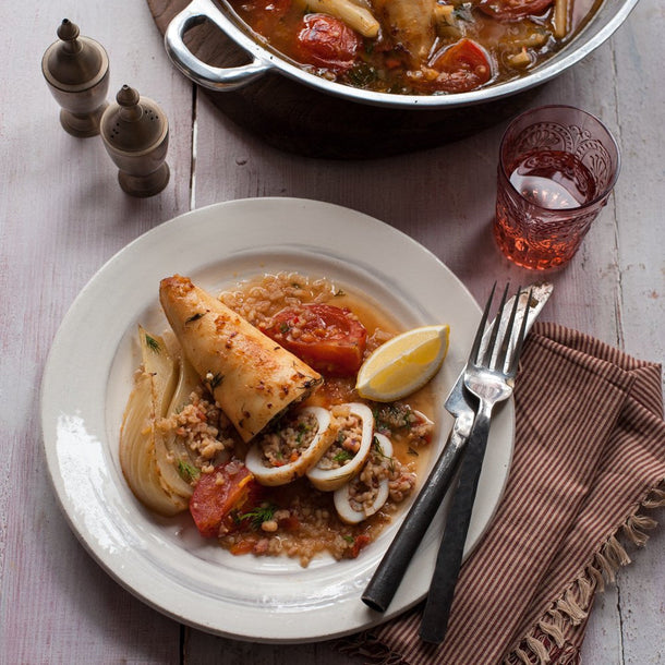 Tender braised squid in rich spiced tomato sauce