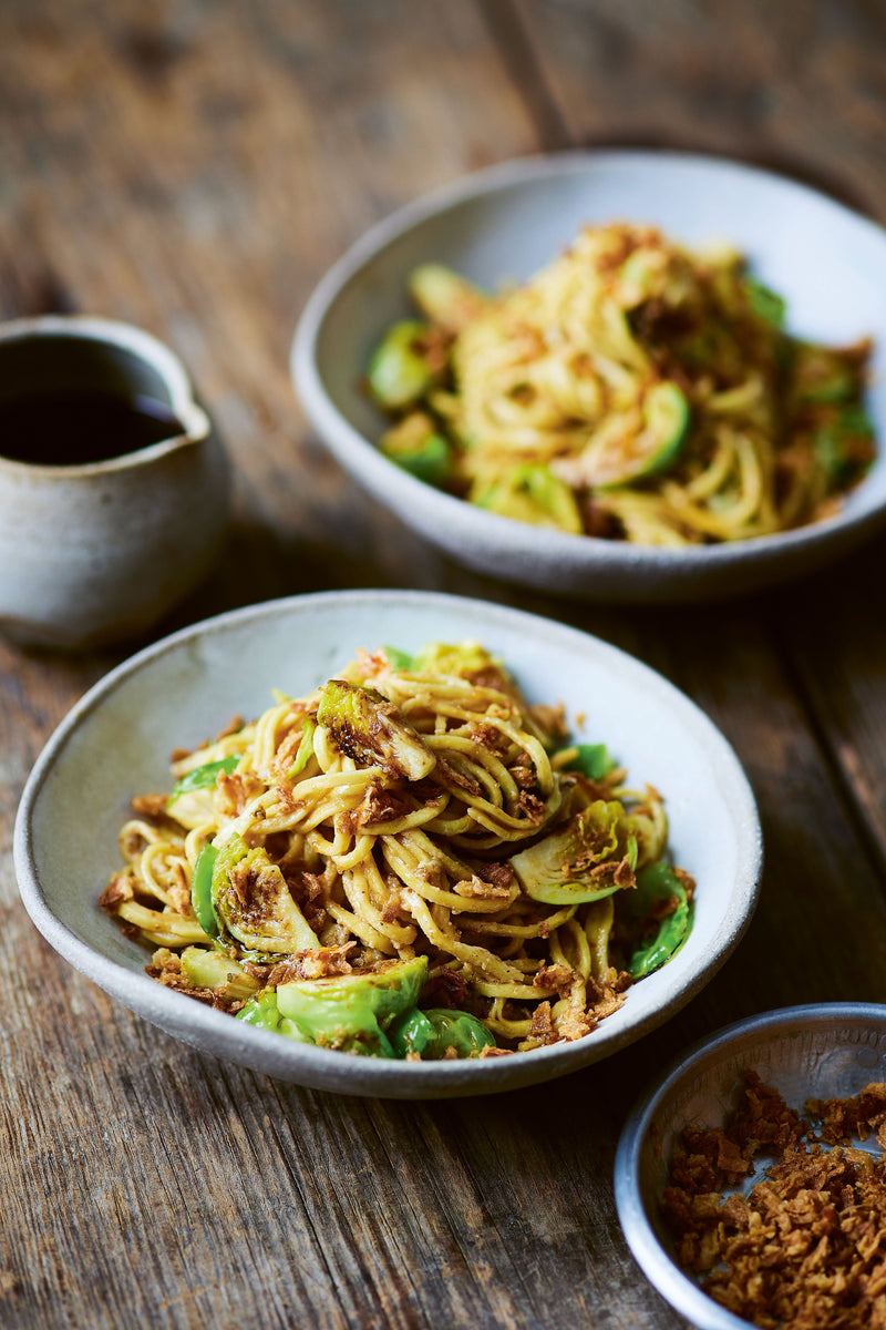2 portions of Sprouts with Egg Noodles and Togarashi next to Spice Kitchen’s signature Togorashi Spice blend