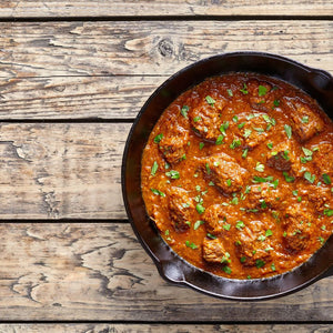 Rajasthani lamb curry with tender lamb pieces in a rich, spiced gravy, infused with traditional Indian herbs and spices.