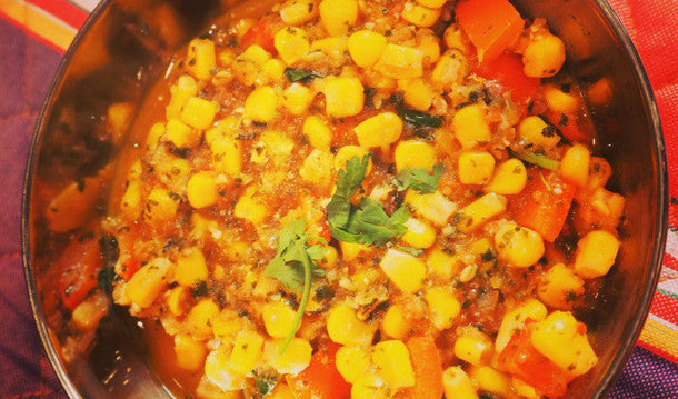 Flavorful corn masala served hot with fresh coriander