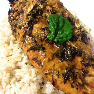 Spicy fenugreek roasted chicken served over seasoned rice.