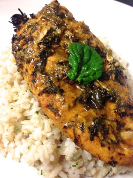 Spicy fenugreek roasted chicken served over seasoned rice.