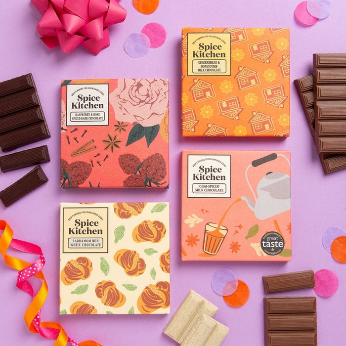 Four Spice Kitchen chocolate bars including Chai Spiced, Cardamom Bun, Raspberry and Rose and Gingerbread and Honeycomb Milk Chocolate
