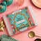 Spice Kitchen Middle Eastern Mezze Feasting Kit on a pink surface with decorative elements.
