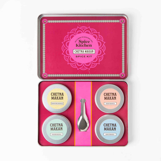 Open lid of Spice Kitchen x Chetna Makan Spice Kit with Four Indian Masala Spice Blends shot on a white background