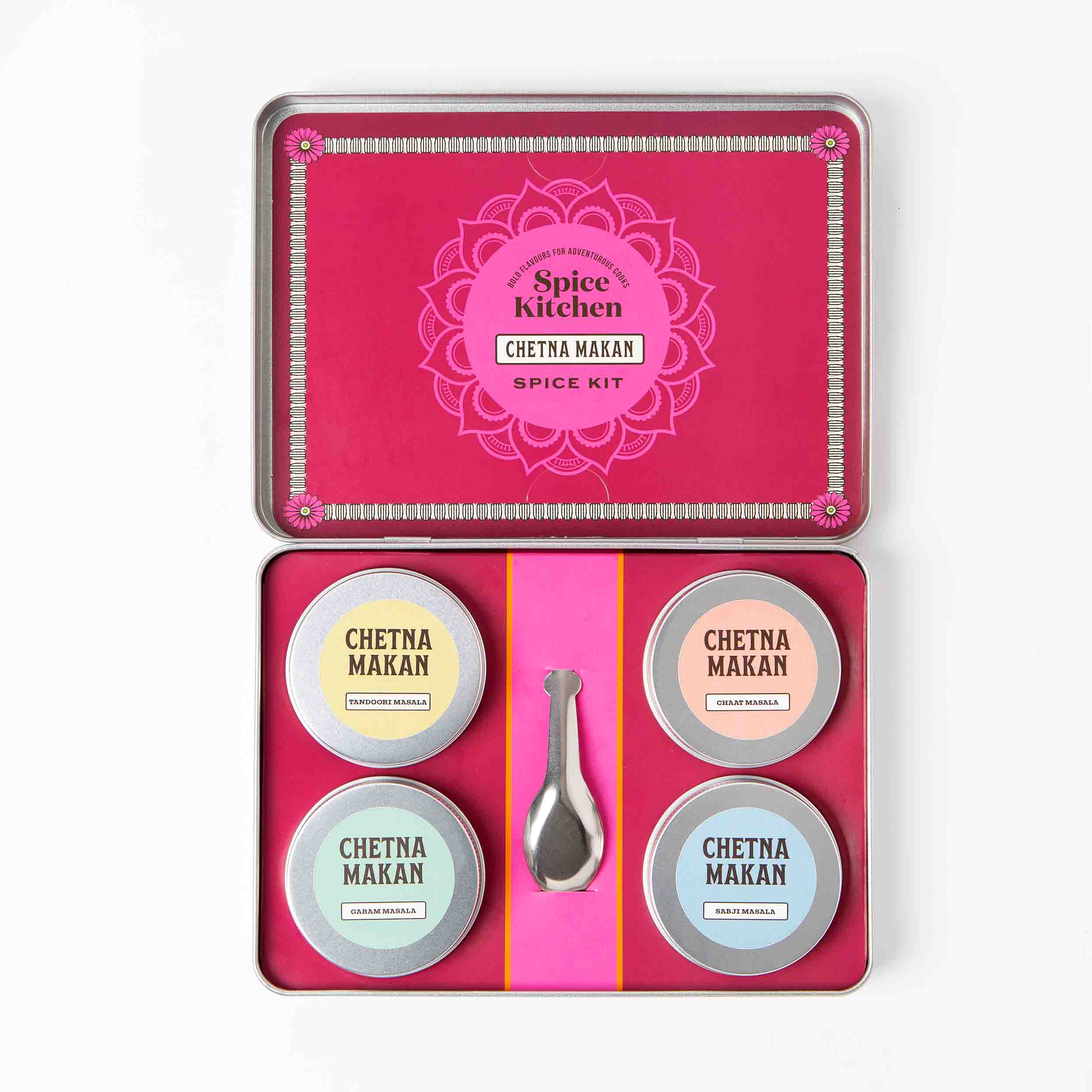 Open lid of Spice Kitchen x Chetna Makan Spice Kit with Four Indian Masala Spice Blends shot on a white background
