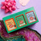 Spice Kitchen World BBQ Collection packaging with a pink bow and tag on a purple background