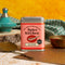 Spice Kitchen Za'atar spice tin on a rustic wooden surface with kitchen items in the background.