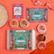 Spice Kitchen Middle Eastern Mezze Feasting Kit elements on an orange background